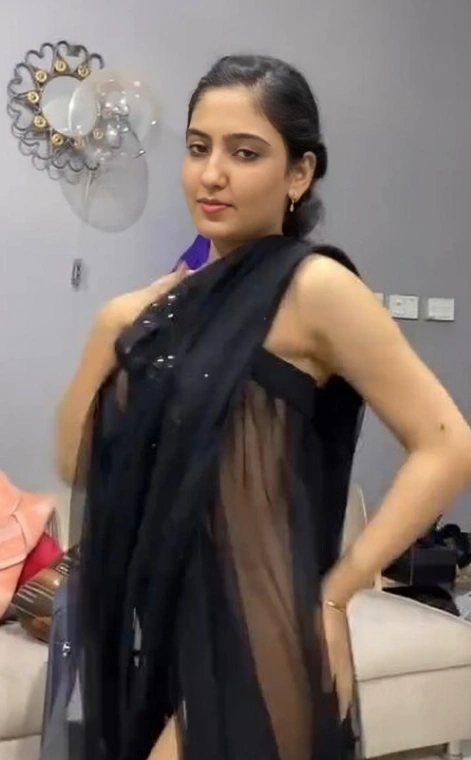 Desi Housewife Teasing Her Boobs and Ass in Sheer Outfit