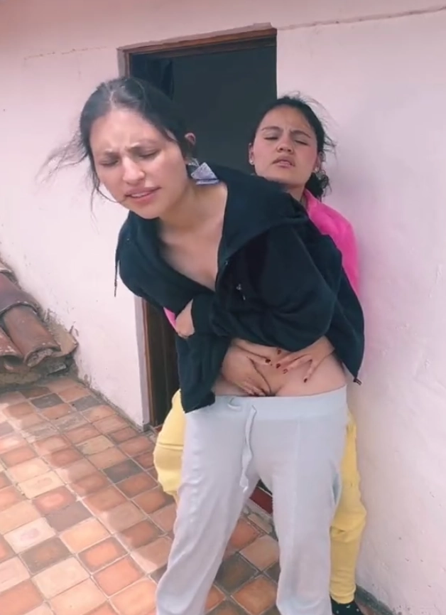 Two horny girls rubbing pussy outdoor terrace